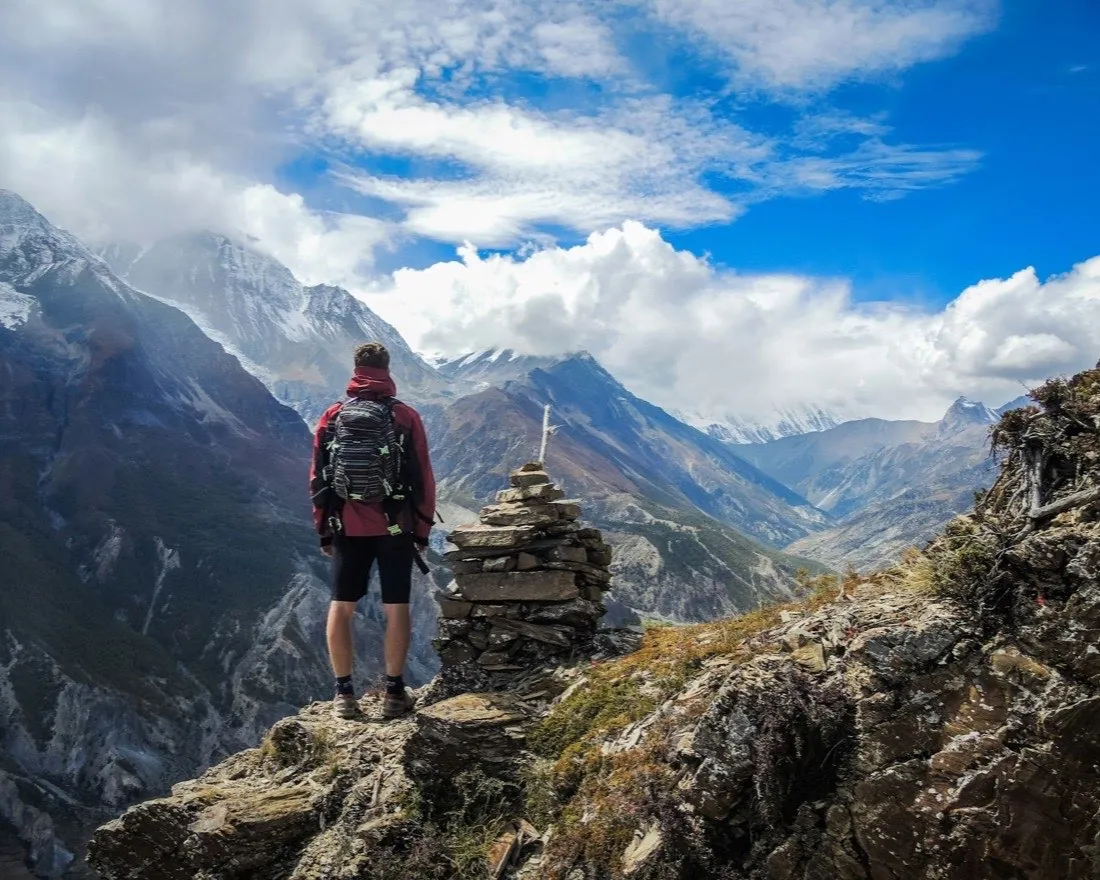 A planner looking out over an alpine valley